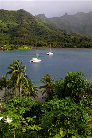 A cruise catamaran in the bay of Hamanee in Tahaa, French Polynesia, Pacific Islands, Pacific Stock Photo - Rights-Managed, Code: 841-06807073