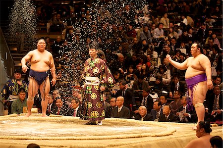 fat man - Some sumo fighters throwing salt before a fight at the Kokugikan stadium, Tokyo, Japan, Asia Stock Photo - Rights-Managed, Code: 841-06807085