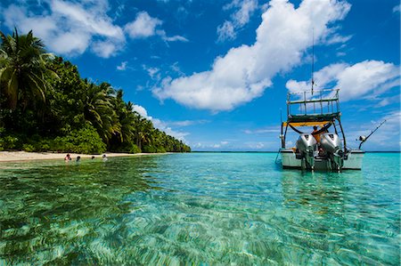simsearch:841-07081635,k - Little motor boat in the turquoise waters of the Ant Atoll, Pohnpei, Micronesia, Pacific Stock Photo - Rights-Managed, Code: 841-06807154