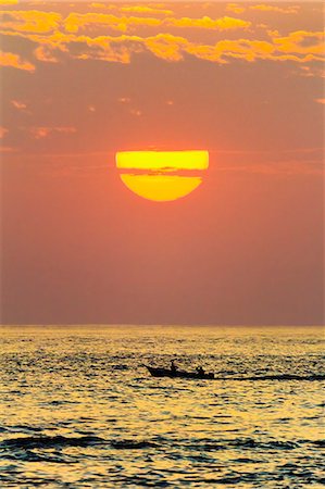simsearch:841-06034119,k - Fishing boat and sunset off Playa Guiones surf beach, Nosara, Nicoya Peninsula, Guanacaste Province, Costa Rica, Central America Stock Photo - Rights-Managed, Code: 841-06807479