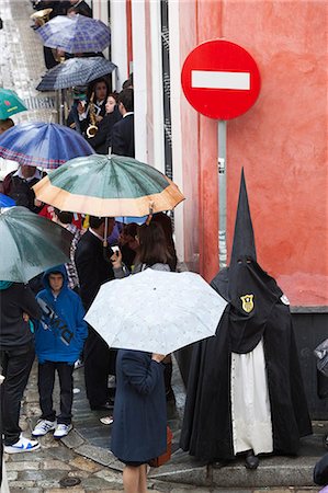 simsearch:841-06807735,k - Penitent during Semana Santa (Holy Week) along rainy street, Seville, Andalucia, Spain, Europe Stock Photo - Rights-Managed, Code: 841-06807735