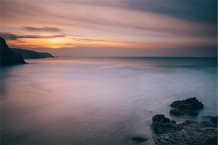 simsearch:841-07081935,k - Porthtowan beach looking along the Cornish coastline at sunset, Porthtowan, Cornwall, England, United Kingdom, Europe Stock Photo - Rights-Managed, Code: 841-07084482