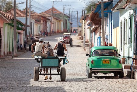 simsearch:841-07081838,k - Horse and cart and vintage American car on cobbled street in the historic centre of Trinidad, UNESCO World Heritage Site, Cuba, West Indies, Central America Stock Photo - Rights-Managed, Code: 841-07081828