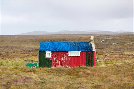 Shieling, a building once used as temporary summer accommodation by farmers while grazing their livestock on common land, off the Pentland Road, near Carloway, Isle of Lewis, Outer Hebrides, Scotland Stock Photo - Rights-Managed, Code: 841-07081845