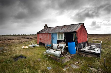 Shieling, a building once used as temporary summer accommodation by farmers while grazing their livestock on common land, off the Pentland Road, near Carloway, Isle of Lewis, Outer Hebrides, Scotland Stock Photo - Rights-Managed, Code: 841-07081846