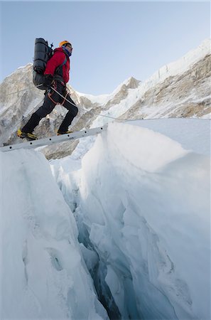 risk mountain - Crossing ladders on the Khumbu icefall on Mount Everest, Solu Khumbu Everest Region, Sagarmatha National Park, UNESCO World Heritage Site, Nepal, Himalayas, Asia Stock Photo - Rights-Managed, Code: 841-07082240