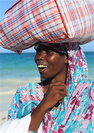 Woman carrying package on head, Zanzibar, Tanzania, East Africa, Africa Stock Photo - Rights-Managed, Code: 841-07083095