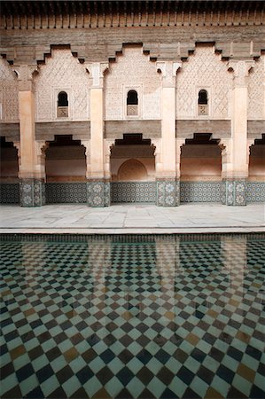 simsearch:841-07083294,k - Columned arcades in the central courtyard of the Ben Youssef Medersa, the largest Medersa in Morocco, originally a religious school founded under Abou el Hassan, UNESCO World Heritage Site, Marrakech, Morocco, North Africa, Africa Stock Photo - Rights-Managed, Code: 841-07083295