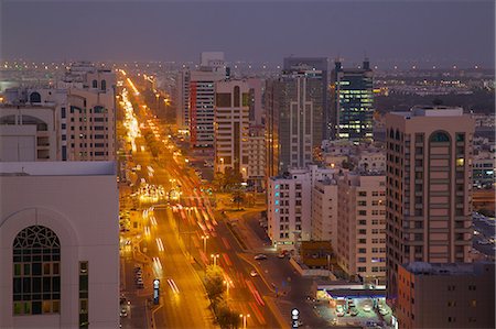 simsearch:841-07083917,k - City skyline and Rashid Bin Saeed Al Maktoum Street at dusk, Abu Dhabi, United Arab Emirates, Middle East Stock Photo - Rights-Managed, Code: 841-07083910