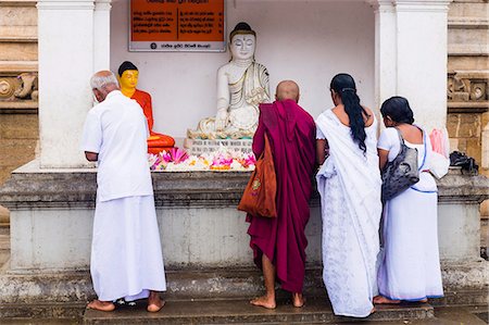 standing buddha - Buddhist people praying at Ruvanvelisaya Dagoba, Mahavihara (The Great Monastery), Anuradhapura, UNESCO World Heritage Site, Sri Lanka, Asia Stock Photo - Rights-Managed, Code: 841-07204263