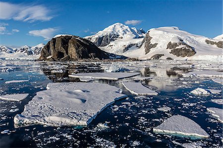 scenic and iceberg - Snow-capped mountains in the Errera Channel on the western side of the Antarctic Peninsula, Antarctica, Southern Ocean, Polar Regions Stock Photo - Rights-Managed, Code: 841-07204275