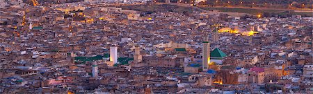 fes morocco - Elevated view across the Old Medina of Fes illuminated at dusk, UNESCO World Heritage Site, Fes, Morocco, North Africa, Africa Stock Photo - Rights-Managed, Code: 841-07204416