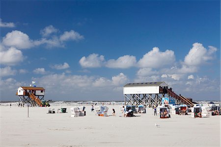 palafito - Stilt house and beach chairs on the beach of Sankt Peter Ording, Eiderstedt Peninsula, Schleswig Holstein, Germany, Europe Stock Photo - Rights-Managed, Code: 841-07204714