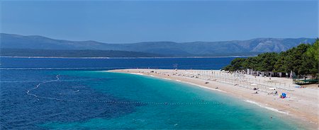 Beach of Zlatni rat (Golden Horn) and the island of Hvar in the background, Bol, Brac, Dalmatia, Croatia, Europe Stock Photo - Rights-Managed, Code: 841-07204815