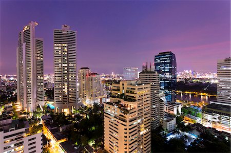 High rise buildings of Bangkok at night from Rembrandt Hotel and Towers, Sukhumvit 18, Bangkok, Thailand, Southeast Asia, Asia Stock Photo - Rights-Managed, Code: 841-07205152