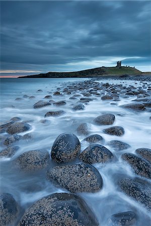 simsearch:841-06807783,k - Dunstanburgh Castle at dawn from Embleton Bay, Northumberland, England, United Kingdom, Europe Stock Photo - Rights-Managed, Code: 841-07205754