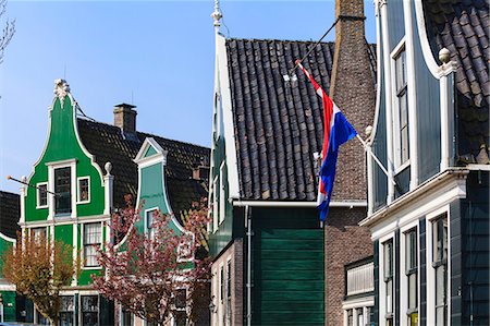simsearch:841-03517157,k - Preserved historic houses in Zaanse Schans, a village on the banks of the River Zaan, near Amsterdam, a tourist attraction and working museum, Zaandam, North Holland, Netherlands, Europe Stock Photo - Rights-Managed, Code: 841-07205868