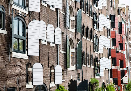 Old canal warehouses converted to houses, Amsterdam, Netherlands, Europe Stock Photo - Rights-Managed, Code: 841-07205883