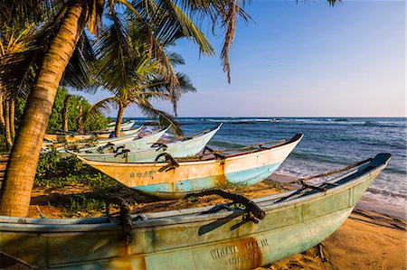 simsearch:841-03672349,k - Traditional Sri Lanka fishing boats on Mirissa Beach, South Coast, Sri Lanka, Asia Stock Photo - Rights-Managed, Code: 841-07201409