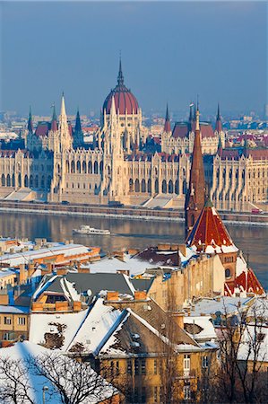 snow city - Hungarian Parliament illuminated by warm light on a winter afternoon, Budapest, Hungary, Europe Stock Photo - Rights-Managed, Code: 841-07201486