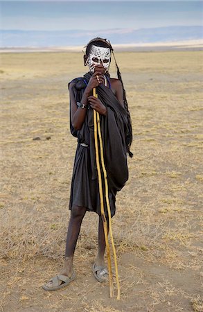 simsearch:841-07201797,k - Young recently circumcised Masai Warrior (moran) with traditional face paint after 'coming of age'  in the Serengei Plains, Tanzania Stock Photo - Rights-Managed, Code: 841-07201676