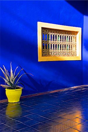 saturated - Detail of blue house and yellow plant pot in Majorelle Garden, Marrakech, Morocco, North Africa, Africa Stock Photo - Rights-Managed, Code: 841-07202139