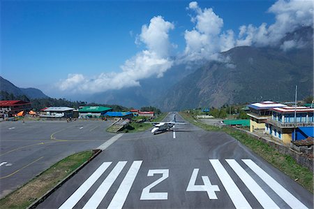 Sita Air Dornier 228 airplane landing on runway, Tenzing-Hillary Airport, Lukla, Nepal, Asia Stock Photo - Rights-Managed, Code: 841-07202428