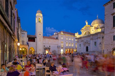 Clock tower and restaurants at dusk, Stradun, UNESCO World Heritage Site, Dubrovnik, Dalmatian Coast, Dalmatia, Croatia, Europe Stock Photo - Rights-Managed, Code: 841-07202480