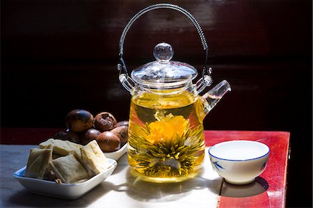 simsearch:841-07457244,k - Flower infused tea and traditional snacks in the Huxinting Teahouse, Yu Garden Bazaar Market, Shanghai, China Stock Photo - Rights-Managed, Code: 841-07457284