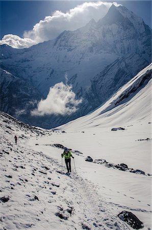 simsearch:841-06446529,k - A hiker ascends the Modi Khola Valley to reach Annapurna Base Camp, 4130m, with Machhapuchhare, 6993m, in the background, Annapurna Conservation Area, Nepal, Himalayas, Asia Stock Photo - Rights-Managed, Code: 841-07457299