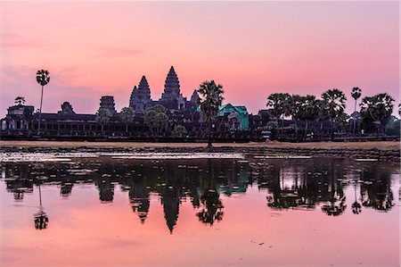 famous architecture in southeast asia - Sunrise over Angkor Wat, Angkor, UNESCO World Heritage Site, Siem Reap Province, Cambodia, Indochina, Southeast Asia, Asia Stock Photo - Rights-Managed, Code: 841-07523324