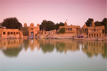 famous buildings in india - Gadi Sagar illuminated at dusk, Jaisalmer, Western Rajasthan, India, Asia Stock Photo - Rights-Managed, Code: 841-07523399