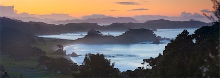 scenic and panoramic - Idyllic Northland coastline illuminated at sunset, Northland, North Island, New Zealand, Pacific Stock Photo - Rights-Managed, Code: 841-07523411