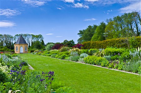 Garden at Ballymaloe Cookery School with Gothic style summer house and perennial borders, County Cork, Ireland Stock Photo - Rights-Managed, Code: 841-07540763