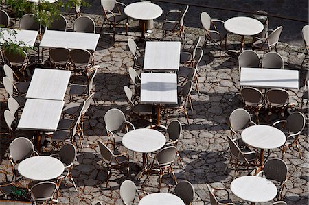simsearch:841-07540886,k - Empty tables at pavement cafe and cobbled pavement in St Emilion, Bordeaux region of France Stock Photo - Rights-Managed, Code: 841-07540887