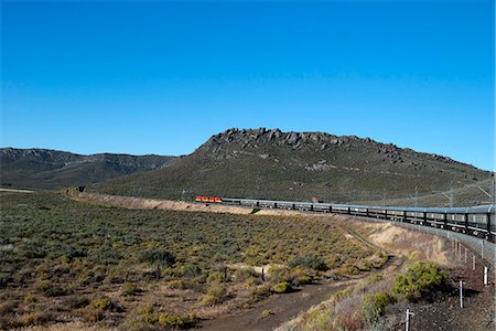 railroad track - Rovos Rail train about to enter a tunnel in the Klein Karoo desert, South Africa, Africa Stock Photo - Rights-Managed, Code: 841-07540945