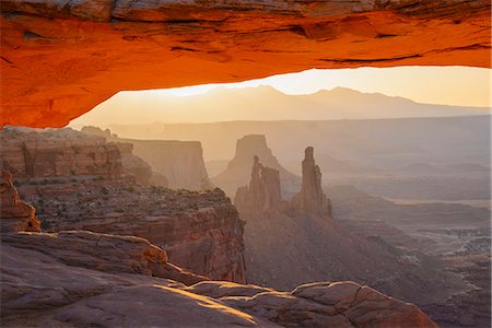 rock arch - Mesa Arch at dawn looking towards Washerwoman Arch, Islands in the Sky section of Canyonlands National Park, Utah, United States of America, North America Stock Photo - Rights-Managed, Code: 841-07600159