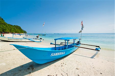 simsearch:841-02899056,k - Outrigger boats on beautiful white sand beach in the national park on the south coast at Pangandaran, West Java, Java, Indonesia, Southeast Asia, Asia Stock Photo - Rights-Managed, Code: 841-07600271