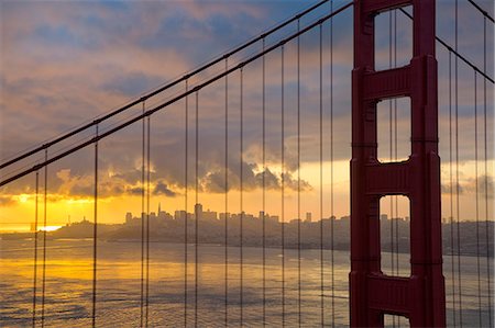 simsearch:841-07653114,k - Golden Gate Bridge at sunrise, San Francisco, California, United States of America, North America Stock Photo - Rights-Managed, Code: 841-07653490