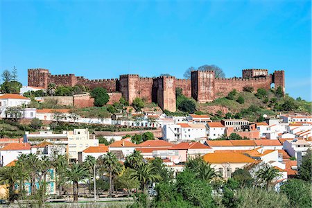 portugal people and culture - Silves skyline with the Moorish castle and the Cathedral, Silves, Algarve, Portugal, Europe Stock Photo - Rights-Managed, Code: 841-07781911
