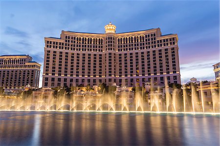 Bellagio at dusk with fountains, The Strip, Las Vegas, Nevada, United States of America, North America Stock Photo - Rights-Managed, Code: 841-07782007