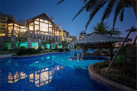 Exterior view of Hilton Hangzhou Qiandao Lake Resort with pool, captured under a full moon, Chun An, Zhejiang, China, Asia Stock Photo - Rights-Managed, Code: 841-07782105