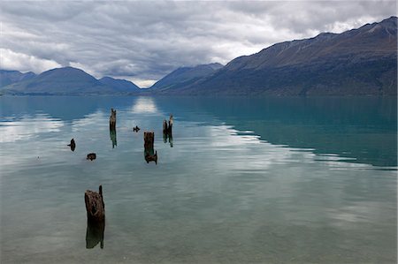 Old pier posts on Lake Wakatipu, Glenorchy, Otago, South Island, New Zealand, Pacific Stock Photo - Rights-Managed, Code: 841-07783064