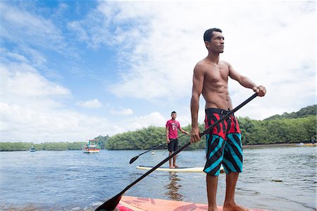 salvador - Locals riding stand-up surf boards, Caraiva River. Bahia, Brazil, South America Foto de stock - Con derechos protegidos, Código: 841-07913769