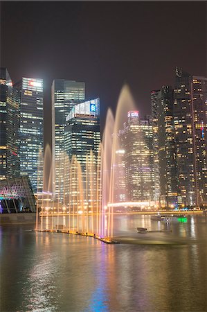 Lightshow in front of downtown central financial district at night, Singapore, Southeast Asia, Asia Stock Photo - Rights-Managed, Code: 841-08031379
