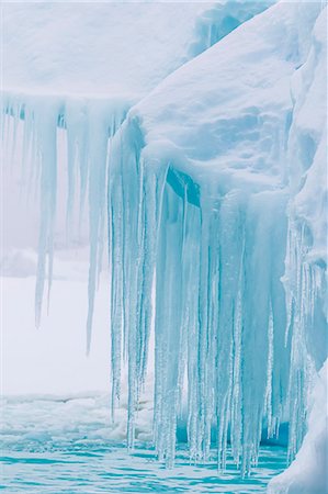 polar region - Wind and water sculpted iceberg with icicles at Booth Island, Antarctica, Polar Regions Stock Photo - Rights-Managed, Code: 841-08101657