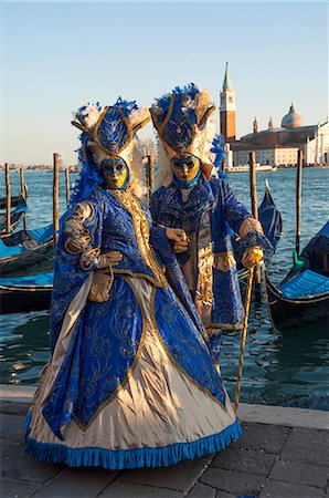 people with masks - Two ladies in blue and gold masks, Venice Carnival, Venice, UNESCO World Heritage Site, Veneto, Italy, Europe Stock Photo - Rights-Managed, Code: 841-08101879
