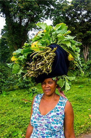 Woman carries a huge stack of vegetables on her head, Sao Tome, Sao Tome and Principe, Atlantic Ocean, Africa Stock Photo - Rights-Managed, Code: 841-08102132