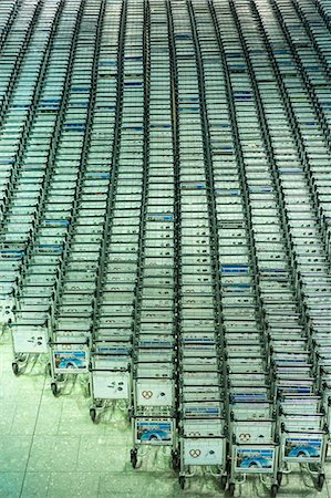 Generic shot of hundreds of luggage trolleys at an airport, United Kingdom, Europe Stock Photo - Rights-Managed, Code: 841-08149568