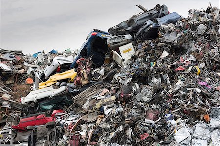 scrap metal - Metal recycling of scrap metal, cars and autos to avoid environmental pollution in England, United Kingdom, Europe Stock Photo - Rights-Managed, Code: 841-08149571